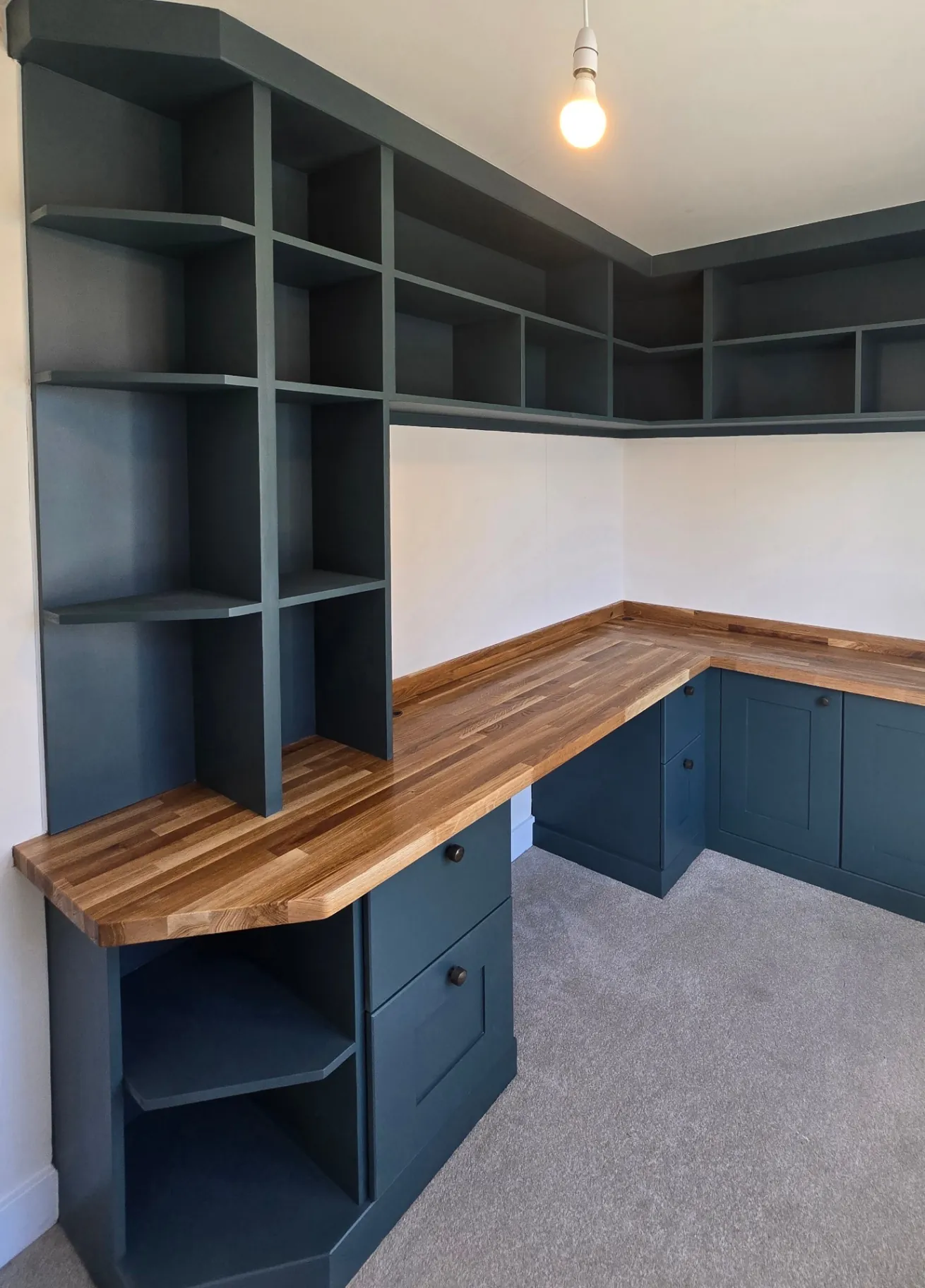 Home office cabinetry sprayed in deep green