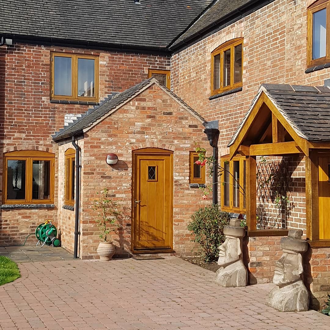 Oak windows, door and porch stained in Osmo oil in Claybrooke Magna, Leicestershire